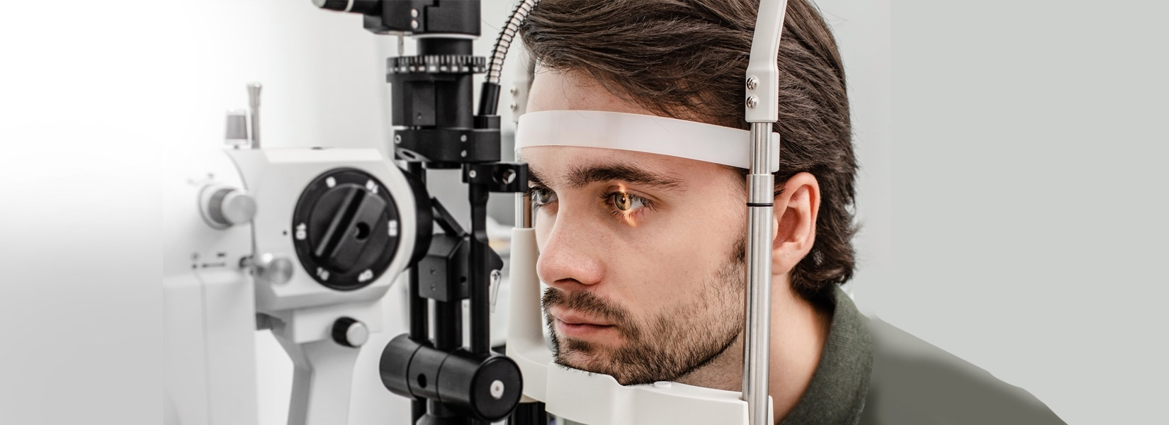 young man during eye exam in Downtown Columbia